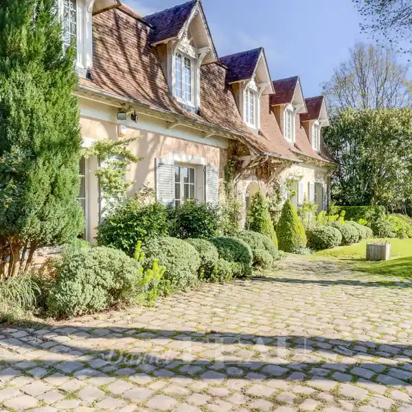 LOVELY HOME ON EXPANSIVE LUSH PROPERTY