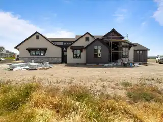 Exquisite New Custom Home with Panoramic Views