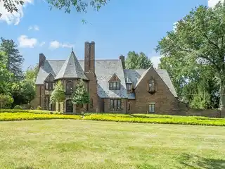 Classic 1920s Tudor with Creekside Landscaping