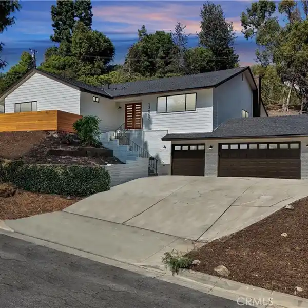 SECLUDED MODERN POOL HOME WITH RESORT-STYLE CHARM