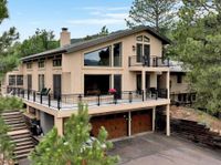 CUSTOM HOME ON TWO ACRES WITH CITY AND GARDEN OF GODS VIEWS