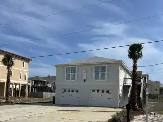 Unique Three Bedroom Home Steps to the Beach