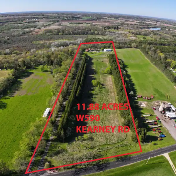 EXPANSIVE CUSTOM HOME ON NEARLY 12 ACRES