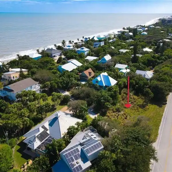 PRIME CORNER LOT WITH DEEDED BEACH ACCESS
