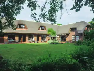 Charming Thatched-roof House
