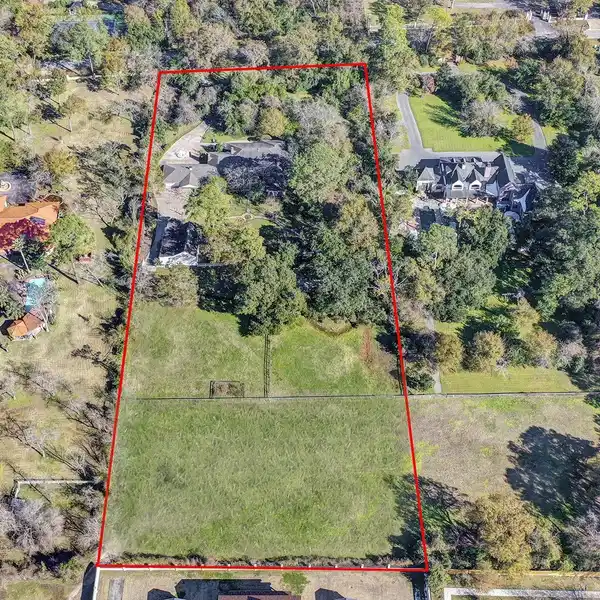 UNIQUE OPPORTUNITY ON 3.7 WOODED ACRES