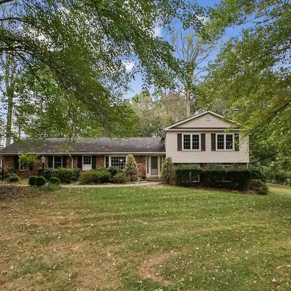 OAKTON PYRAMID HOME WITH BONUS ROOM AND ACREAGE