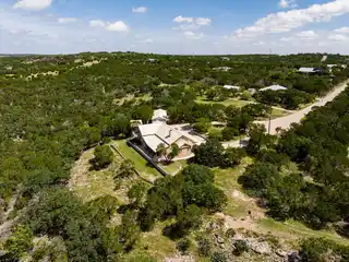 Beautiful Two-Story Rock Home on 6+ Acres