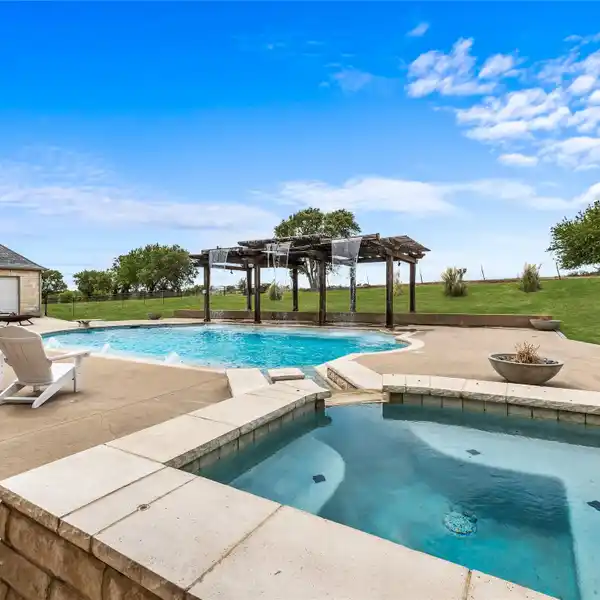 TRANQUIL LUXURY ON NEARLY FOUR ACRES