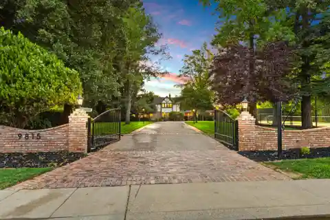 Luxurious Tudor-Style Estate on Manicured Grounds