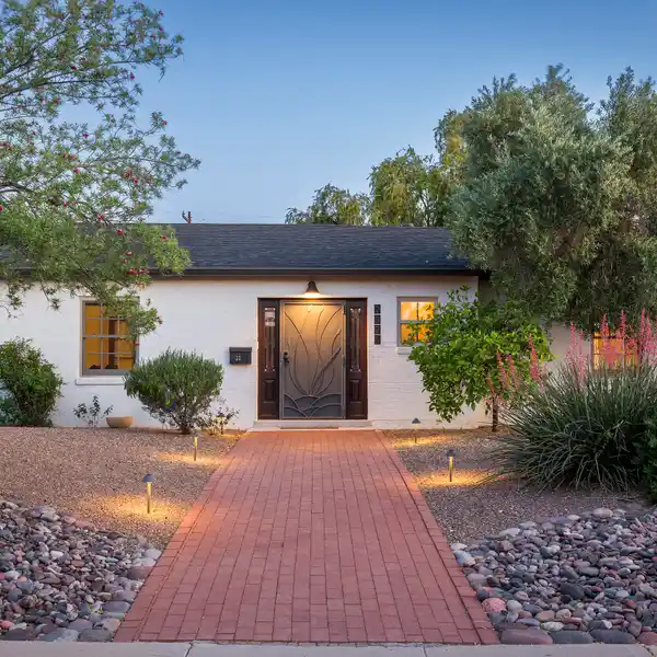 RARE ARCHITECT-DESIGNED HOME IN THE SAM HUGHES AREA