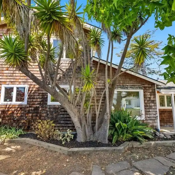 UNIQUE CUSTOM HOME IN PRIME SEACLIFF LOCATION
