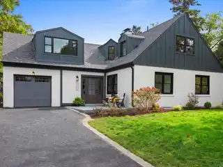 Golf Course Elegance with Sunroom and Designer Kitchen
