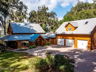 Elegant Riverfront Home on Double Lot