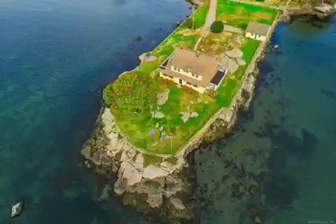 Incredible Dutch Colonial Revival Estate on Its Own Peninsula