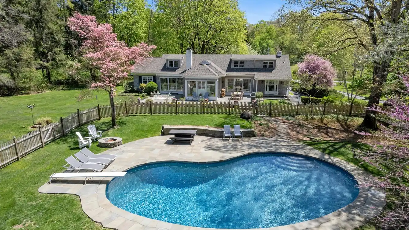 Hamptons-esque Cape Cod on Verdant Property