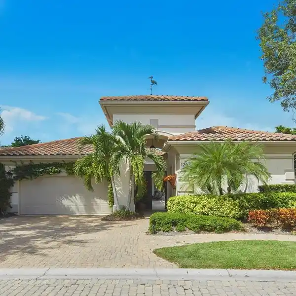 LUXURY COURTYARD HOME TUCKED WITHIN EXCLUSIVE GATE