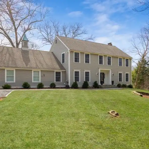 LOVELY COLONIAL IN A PARK-LIKE SETTING