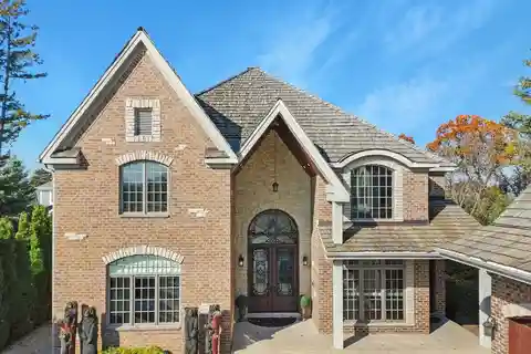 Grand Lakefront Estate with Exceptional Amenities