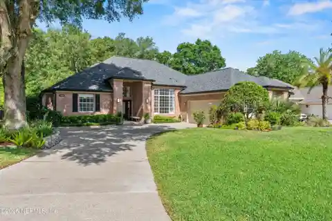 Elegant Brick Home with Tranquil Water Views