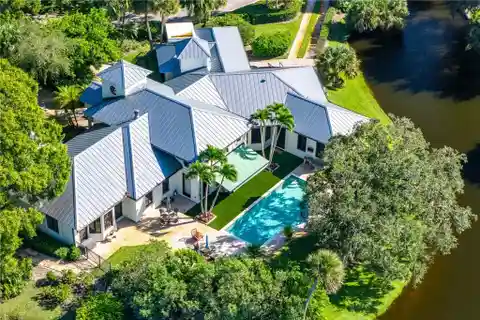 Stunning Lake Views on 3 Sides & Beautifully Landscaped