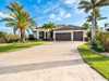CUSTOM WATERFRONT HOME WITH STUNNING PANORAMIC VIEWS