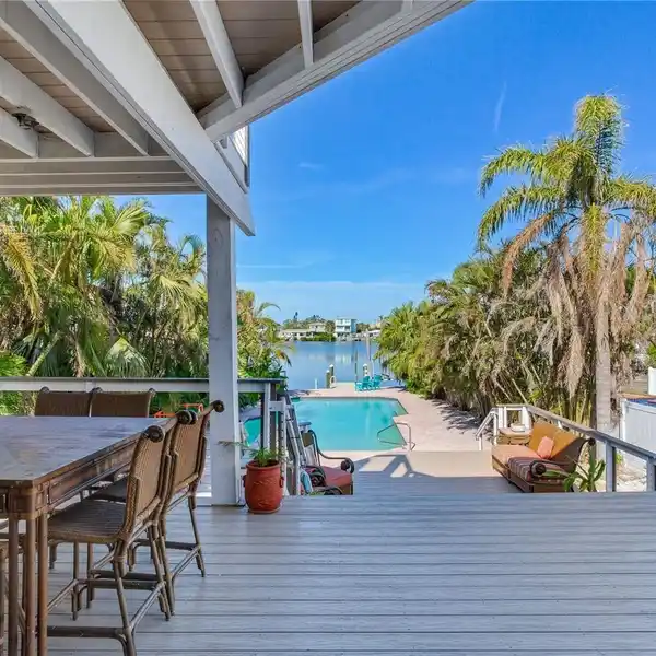 ELEVATED COASTAL DREAM WITH OVERSIZED POOL
