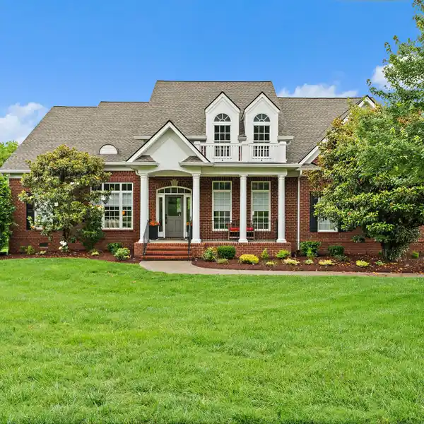 ELEGANT 5-BEDROOM HOME ON HALF-ACRE LOT