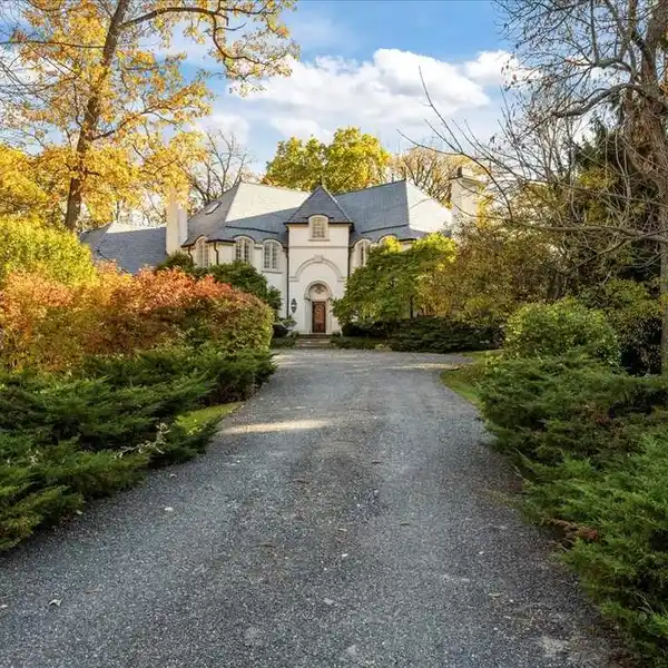 ELEGANT FRENCH-INSPIRED RESIDENCE OFFERING RESORT-STYLE LIVING