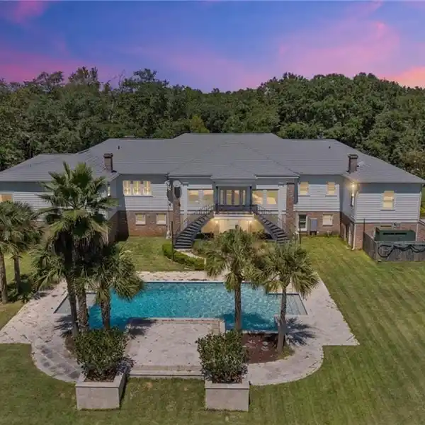 SECLUDED 58-ACRE ESTATE WITH LAKE AND POOL