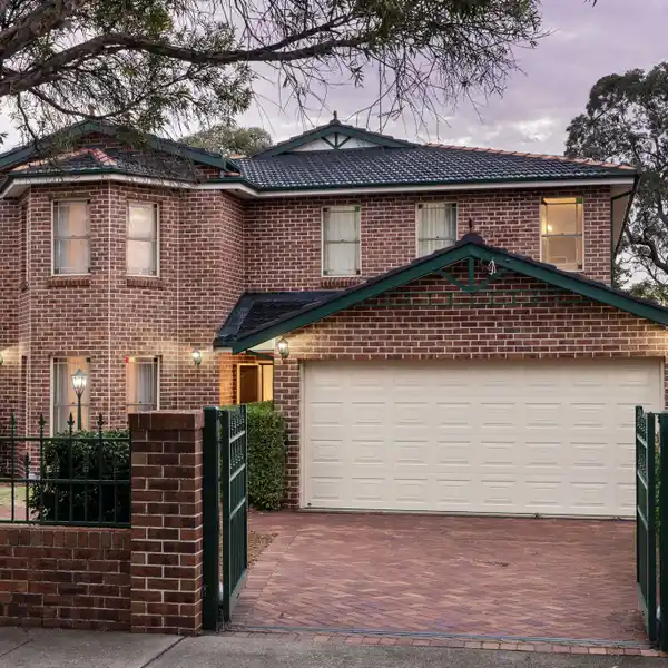 BEAUTIFULLY MAINTAINED BRICK RESIDENCE