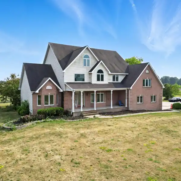 ONE-OF-A-KIND PROPERTY OVER SEVEN LUSH ACRES