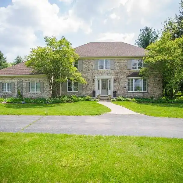 GORGEOUS BRICK HOME IN HIGHLAND ESTATES