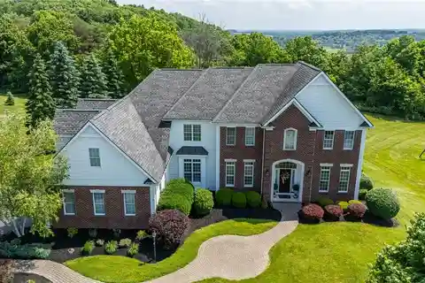 Elegant Brick Estate Steps from Cobblestone Country Club