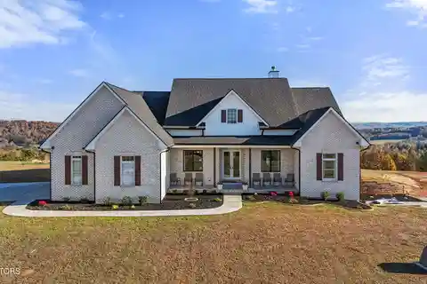 Stunning Custom Brick Ranch Offering Incredible Sunrises