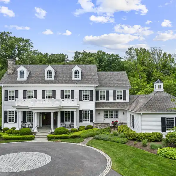 CUSTOM-BUILT COLONIAL REVIVAL-STYLED HOME ON OVER TWO ACRES