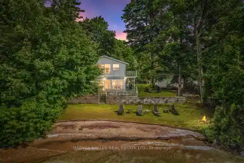 Rare Waterfront Home with Private Beach