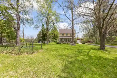 Charming Acreage with Barn and Art Studio