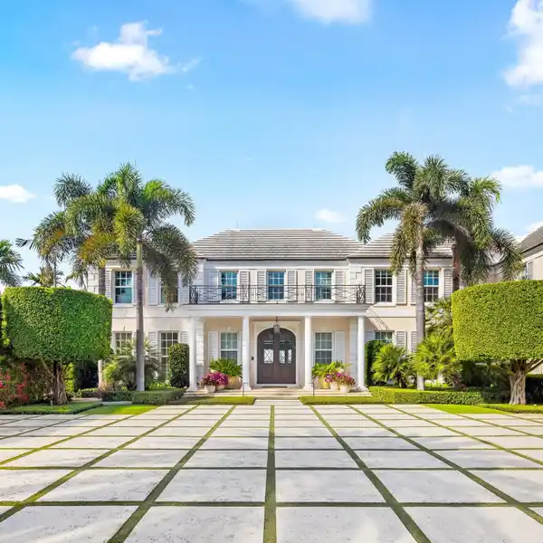 GEORGIAN-STYLE RESIDENCE ON COVETED EVERGLADES ISLAND
