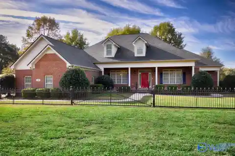 Elegant Brick Estate with Serene Acreage and Luxury Touches