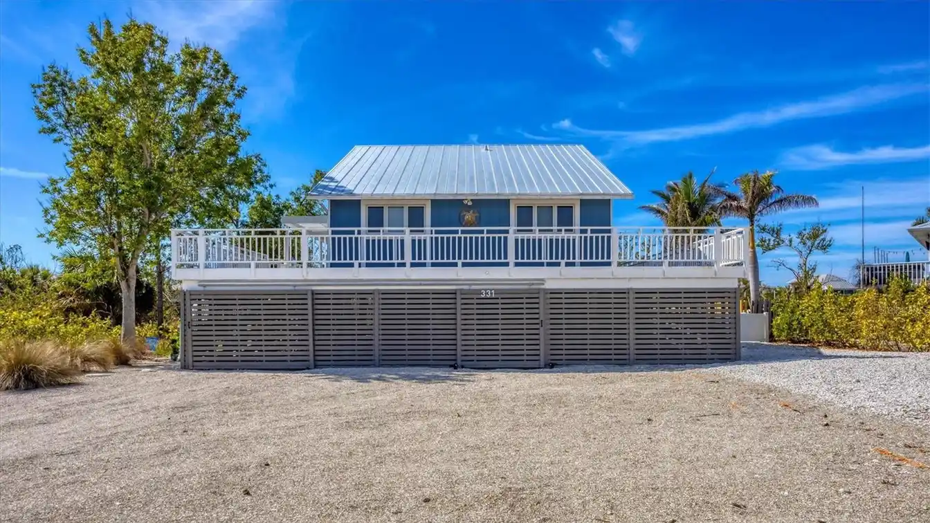 Key West Style Waterfront Home on Palm Island