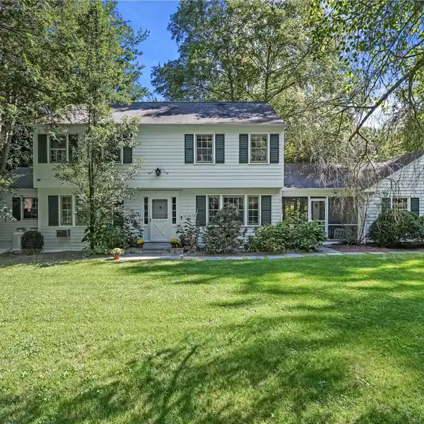 CLASSIC CENTER HALL COLONIAL ON THREE-PLUS ACRES