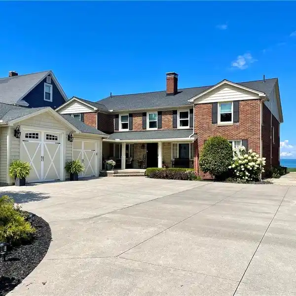 ELEGANT BRICK COLONIAL WITH PRIVATE BEACH ACCESS