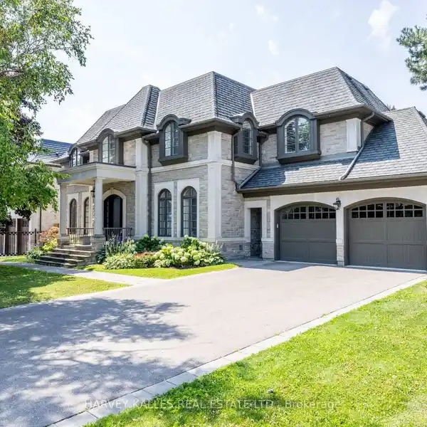 INDIANA LIMESTONE SHOWPIECE WITH DESIGNER INTERIORS & 4-CAR GARAGE