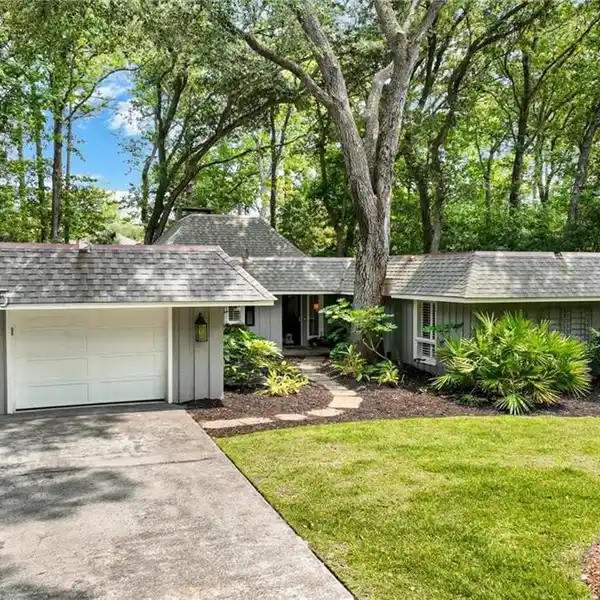 COASTAL CHARM MEETS MODERN LUXURY IN THIS BEAUTIFULLY RENOVATED BEACHSIDE COTTAGE