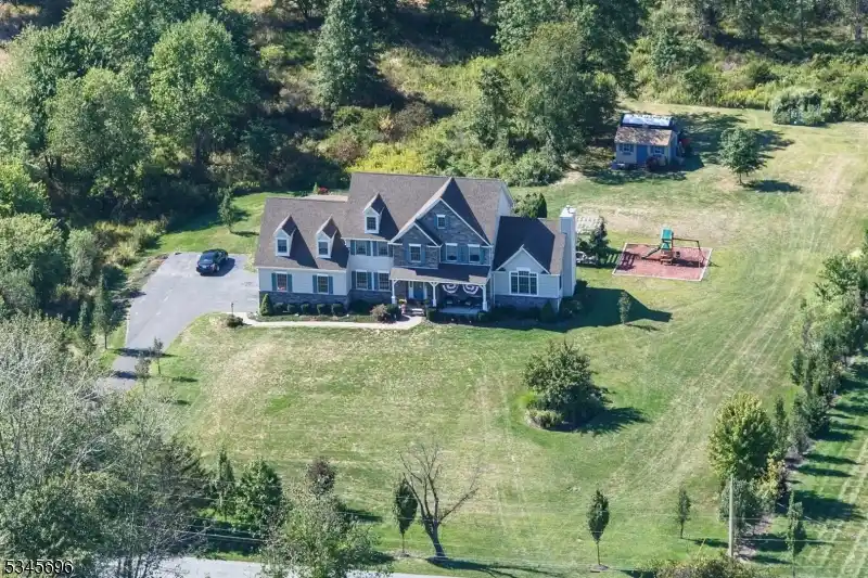 Gorgeous Colonial on Three Level Acres