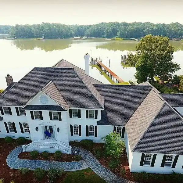 SPECTACULAR RESIDENCE PRIVATELY SITUATED ON GATED PENINSULA LOT
