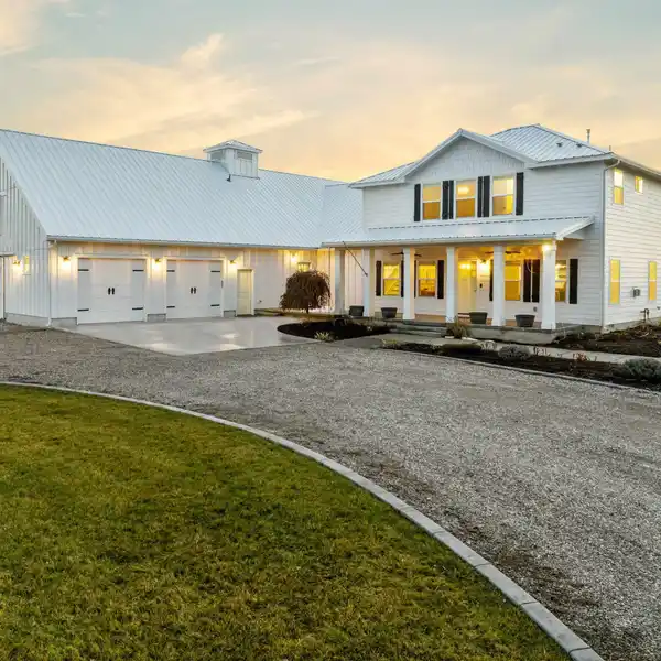 CUSTOM MODERN FARMHOUSE SET ON EXPANSIVE ACREAGE