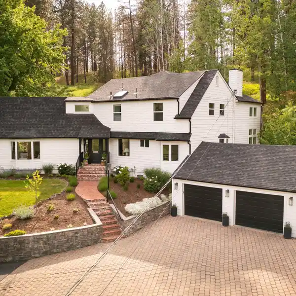 STUNNING REMODEL ON FIVE SECLUDED ACRES