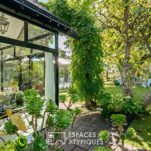 BRIGHT CONTEMPORARY HOME IN AN ENCHANTING SETTING